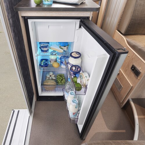 REFRIGERATOR DOORS | The double-hinged refrigerator doors give you flexible access.